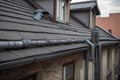 downpipes on the roof of a house during repair work Royalty Free Stock Photo