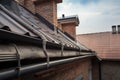 downpipes on the roof of a house during repair work Royalty Free Stock Photo