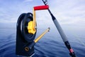 Downrigger angler fishing tackle in blue sea Royalty Free Stock Photo