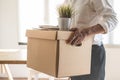 Downsize business. Employee moving off from office after sacked from company