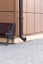 Downspout and bench Royalty Free Stock Photo