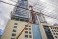 Downtown Atlanta men on scaffolding working and cranes Royalty Free Stock Photo