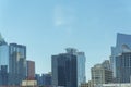 Downtown austin texas with office building and reflective glass with blue and hazy white sky in afternoon sun midday Royalty Free Stock Photo