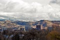 Downtown Boise on a winter day with snow capped mountains in the background