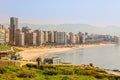 Downtown buildings and towers with road, sandy beach and sea in the foreground, Beirut, Lebanon Royalty Free Stock Photo