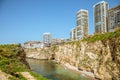 Downtown buildings and towers with rocks and sea in the foreground, Beirut, Lebanon Royalty Free Stock Photo