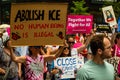 Protest against ICE. Sign reads `Abolish ICE, No Human Being is Illegal`