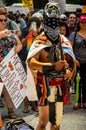 Protest against Immigration ICE and Border Patrol. A Mexican man is dressed in native Aztec costume Royalty Free Stock Photo