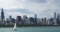 Downtown Chicago skyline on waterfront with sailboat