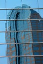 Downtown City Skyscraper Reflecting in Mirrored Windows