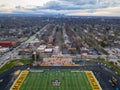 Downtown Cleveland in the background under stormy spring skies, shot from over the Cleveland Heights high school staidum