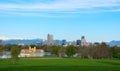 Downtown Denver panoramic skyline buildings with snowcapped mountains and trees Royalty Free Stock Photo