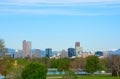 Downtown Denver panoramic skyline buildings with snowcapped mountains and trees Royalty Free Stock Photo