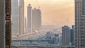 Downtown Dubai towers in the evening timelapse. Aerial view of Sheikh Zayed road with skyscrapers at sunset. Royalty Free Stock Photo