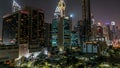 Downtown Dubai towers night timelapse. Aerial view of Sheikh Zayed road with skyscrapers. Royalty Free Stock Photo