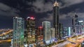 Downtown Dubai towers night timelapse. Aerial view of Sheikh Zayed road with skyscrapers.