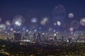 Downtown Los Angeles city scape with flashing fireworks on new years