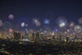Downtown Los Angeles Cityscape with exploding fireworks during New Years Eve