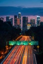 The downtown Los Angeles skyline and 110 Freeway at night, from Elysian Park, in Los Angeles, California Royalty Free Stock Photo