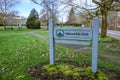 Downtown Mercer Island, Mercerdale Park sign with green space in background