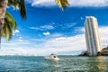 Downtown Miami along Biscayne Bay with condos and office buildings, yacht sailing in the bay Royalty Free Stock Photo
