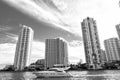 Downtown Miami along Biscayne Bay with condos and office buildings, yacht sailing in the bay Royalty Free Stock Photo