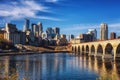 Downtown Minneapolis, Minnesota as seen from the famous stone arch bridge Royalty Free Stock Photo