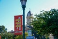 Downtown Monroe Lamp post banner with court house in the background