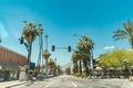 Downtown Palm Springs Street with traffic lights and palm trees