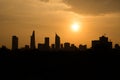 Downtown Saigon in sunset with golden sky ( back light view from T