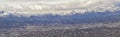 Downtown Salt Lake City Panoramic view of Wasatch Front Rocky Mountains from airplane in early spring winter with melting snow and Royalty Free Stock Photo