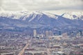 Downtown Salt Lake City Panoramic view of Wasatch Front Rocky Mountains from airplane in early spring winter with melting snow and Royalty Free Stock Photo