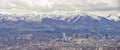 Downtown Salt Lake City Panoramic view of Wasatch Front Rocky Mountains from airplane in early spring winter with melting snow and Royalty Free Stock Photo