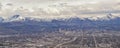 Downtown Salt Lake City Panoramic view of Wasatch Front Rocky Mountains from airplane in early spring winter with melting snow and Royalty Free Stock Photo