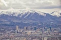 Downtown Salt Lake City Panoramic view of Wasatch Front Rocky Mountains from airplane in early spring winter with melting snow and Royalty Free Stock Photo