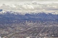 Downtown Salt Lake City Panoramic view of Wasatch Front Rocky Mountains from airplane in early spring winter with melting snow and Royalty Free Stock Photo