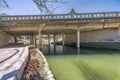 Downtown San Antonio, Texas- River walk concrete path under a bridge with decorative barriers Royalty Free Stock Photo