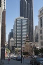 Downtown of San Francisco. Skyscrapers, cars, people walking