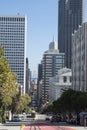 Downtown of San Francisco. Skyscrapers, modern architecture, cars, people walking