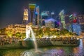 Downtown Singapore night skyline from marina Bay area Royalty Free Stock Photo