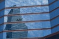 Downtown skyscrapers disctrict with mirror blue sky reflection Royalty Free Stock Photo