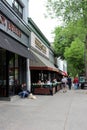 Downtown stores and people strolling about, Broadway, Saratoga Springs, New York, 2018