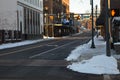 Downtown Street Scene With Melting Snow Royalty Free Stock Photo