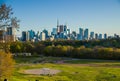 Downtown Toronto, cityscape skyline view Riverdale park east. People walking in the park