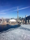 Downtown Toronto skyline, late winter, with ice on Lake Ontario