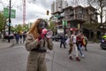 DOWNTOWN VANCOUVER, BC, CANADA - APR 26, 2020: An antifa member disrupts an anti lockdown protest march.