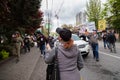 DOWNTOWN VANCOUVER, BC, CANADA - APR 26, 2020: An antifa member disrupts an anti lockdown protest march.