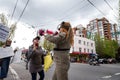 DOWNTOWN VANCOUVER, BC, CANADA - APR 26, 2020: An antifa member disrupts an anti lockdown protest march.