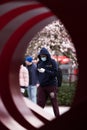 DOWNTOWN VANCOUVER, BC, CANADA - APR 01, 2020: Pedestrian in downtown Vancouver wearing a medical facemask and latex medical