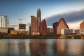 Downtown view across Lady Bird Lake or Town Lake on Colorado River at sunset golden hour in Austin, Texas, USA Royalty Free Stock Photo